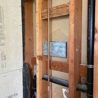 GB Plumbing technician performing a residential plumbing repair in Burlingame CA