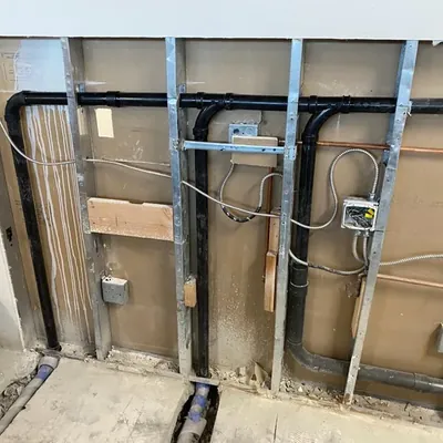 GB Plumbing repairing a kitchen plumbing connection in Burlingame CA